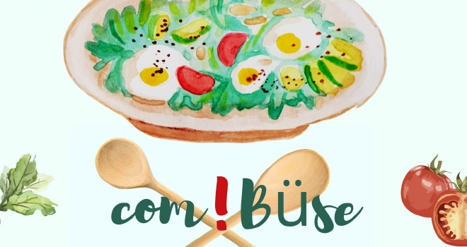 Ein gemalter Teller mit Essen, darunter gekreuzte Kochlöffel